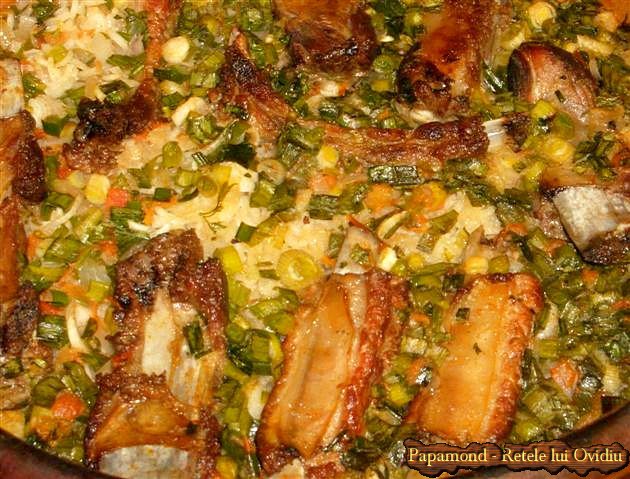 coasta de porc pe orez cu usturoi si ceapa verde 3